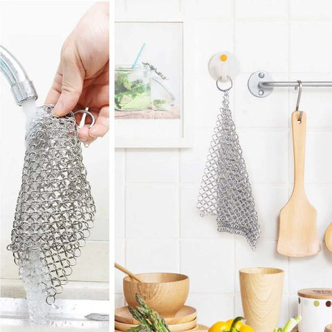 8x6 Inch Cast Iron Chainmail Scrubber hanging and being washed, stainless steel, for safe scratch free cleaning of pots and pans
