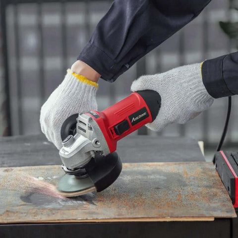 Heavy Duty 7.5 Amp 4.5 Inch Corded Angle Grinder With 11000 RPM Kickback Resistant Motor cutting through metal with sparks flying.