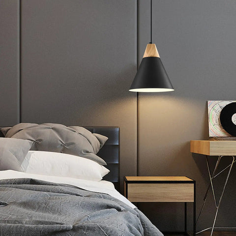 Bedroom setting with Dope Black Pendant Light Two Pack 9.4 Inch Farmhouse Modern Pendant Lighting, wood accent, sleek black finish above nightstand.