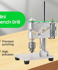 Tiny Benchtop Drill Press Precision Watch Repair Tool Adjustable Speed Up To 4500Rpm with precision chuck on a wooden surface.