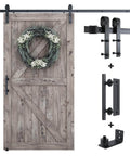 Eight Point Two Foot Sliding Barn Door Hardware Kit With Smooth Quiet Track Easy To Install Includes Step By Step Installation Instructions Fits Forty Eight Inch Wide Door Panel J Shape Hanger Beefy Alloy Construction With Black Powder Coat, featuring installed barn door with hardware components.