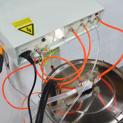 Jaryannix 110V Electrostatic Powder Coating Machine With Fast 500 G Min Output showing electrical connections and tubing setup.