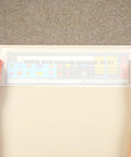 Person applying EZ-Fit Desktop Helper Tape Strips Pack of 36 Student Desk Name Tags Pre Cut Durable and Versatile Classroom Labels