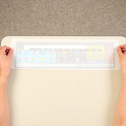 Person applying EZ-Fit Desktop Helper Tape Strips Pack of 36 Student Desk Name Tags Pre Cut Durable and Versatile Classroom Labels