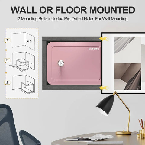 Wall-mounted pink home safe box for kids and money, compact lock box with key shown next to a desk lamp and chair.