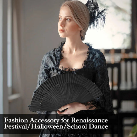 Woman holding Black Hand Fan For Stage And Rave Dancers With Elaborate Design And Satisfying Snap Clack Go To Handheld Fan For Line Dancers 13 Inch Closed Size For A Bold Onstage Statement, dressed in black lace attire, feathered hat.