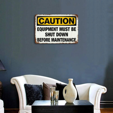 Dope Vintage Metal Tin Sign 8x12 Inch Caution Equipment Must Be Shut Down Before Maintenance in living room setting on dark wall