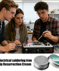 Students using soldering iron with Pro Grade Soldering Iron Tip Cleaner Block for kits and repairs on a circuit board.