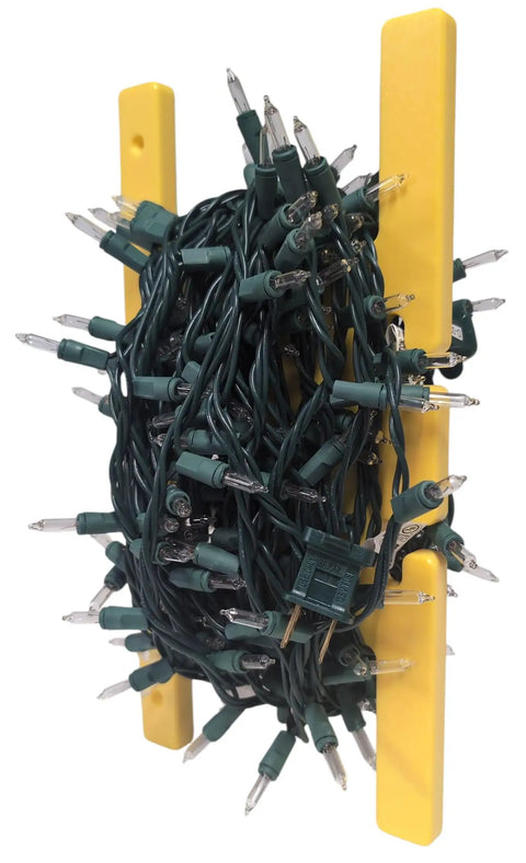Heavy Duty Extension Cord Reel And Yellow Cord Organizer Set Two Pack That Holds 100 Feet Each shown with wrapped lights