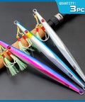 Three Pack Saltwater Jigging Spoons Set 160g Deep Sea Glow Lures With Assist Hooks, 21cm, blue silver purple finish, shown on rod
