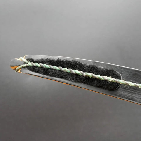 Calf Hair Recurve Bow Limb Dampeners 2 Pack For Quiet Release And Smoother Shots shown applied on bow limb