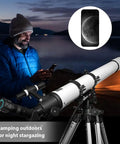 Person using WiFi Electronic Eyepiece For Telescope Camera With 4K Video Recording outdoors, night stargazing scene