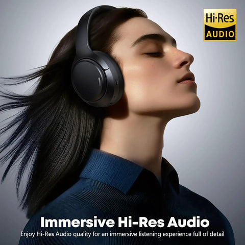 Person wearing Long Battery Life Wireless Headphones with Active Noise Cancelling, enjoying Hi-Res Audio experience