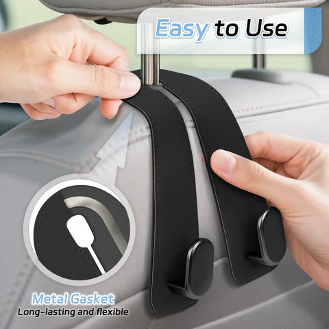 Top Shelf Universal Car Seat Headrest Hooks 2 Pack Suede Leather Bag Holders For Purses Coffee Mugs And Grocery Totes; easily attachable hooks showcasing metal gaskets.