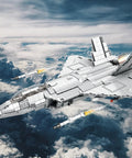 F-22 Raptor Fighter Jet Building Block Set flying with missiles, 1837 pieces, ideal for military aircraft lovers, age 14+.