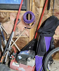 One Quarter Inch Polyurethane Air Hose Reinforced Lightweight Compressor Tubing Finish Safe And Slick Built Tough With Zero Drag For Auto Repair And Real Shop Grind Daily coiled above an air compressor in a garage.