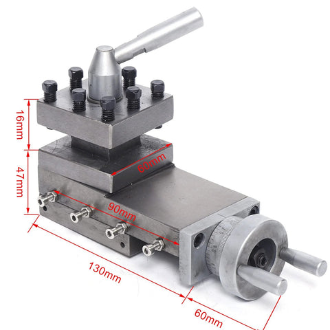 Swing lathe tool post assembly on steel base with top turret, bolts, and hand crank