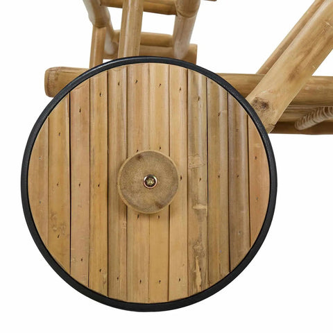 Premium Bamboo Serving Trolley Featuring Slick Smooth Rolling Casters For Easy Room To Room Transit And A Rock Solid Mobile Bar Or Kitchen Rolling Cart Option Built To Conquer Your Daily Grind Without Breaking A Sweat wheel detail showing bamboo construction and smooth gliding surface.