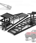 Pair Of Hydraulic Car Ramps With Wheels, Heavy Duty 5 Ton Lift Ramps For Oil Changes, side view of black ramps with jeep