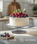 Puroma 12-inch aluminum rotating cake turntable with non-slip silicone bottom, supporting a frosted berry-topped cake