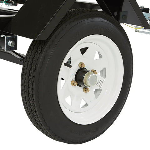Close-up of wheel on Built Tough Steel Utility Trailer Kit 40x48 Inches For Hauling Gear, 1200 Lb GVWR, sturdy steel frame