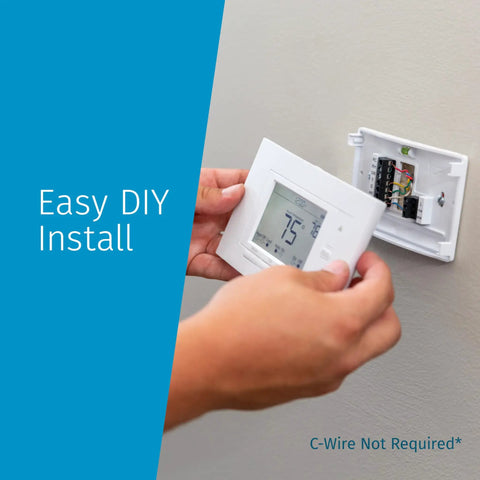 Person installing Smart Wi-Fi Thermostat for Home Automation and DIY Friendly, Works With Alexa, Energy Star Certified, on wall