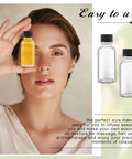 Clear Boston Round Glass Bottles With Black Screw Cap, One Oz Capacity, Complete Kit With Seventy Two Self Stick Labels, Four Precision Funnels, And Fine Liner For Slick DIY Blending, No Fuss Organization, And Totally Solid Storage Set, shown with yellow liquid in hand.
