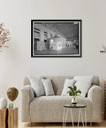 Vintage Framed Print Of Wilson Dam And Hydroelectric Plant Turbine And Generator Unit Spanning The Tennessee River On Wilson Dam Road In Muscle Shoals Alabama A Totally Dope Historical Wall Art For Home Decor From Library Of Congress Archive displayed above a sofa in a living room.