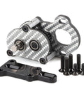 Ridiculously Light Carbon Fiber Portal Transmission Gearbox For 1 To 10 Scale RC Crawlers with mounting screws displayed