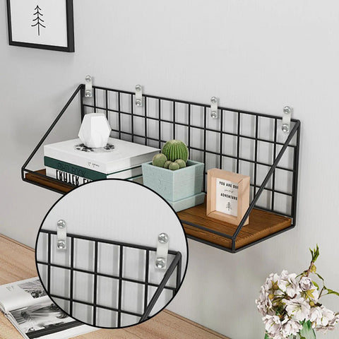 Close-up of black metal wire shelf mounted on wall using 24 Piece Wire Shelf Clip Kit With Screws And Expansion Tubes For Metal Shelving And Wall Mounts White Plastic Down Wall Clips Easy Install For Concrete And Wood Projects.