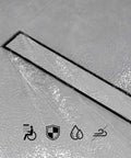 32 Inch Linear Shower Drain With Tiled Insert, 304 Stainless Steel Brushed Finish, 2 Inch Outlet, installed in tiled shower floor.