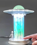 UFO Abduction LED Lamp With Tiny People Figures, silver UFO with glowing tractor beam, touch control, sci-fi desk decor