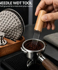 Wood handle WDT tool beside Three Pack 53 Point 3 Millimeter Espresso Puck Screen Kit For 54 Millimeter Portafilters