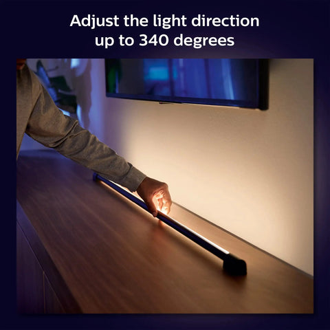 White And Color Ambiance Smart LED Tube For Immersive Gaming And TV Experiences 1 Pack Sync With TV Music And Gaming Requires Bridge And Sync Box Control With App Or Voice being adjusted on a shelf
