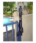 Straight Up Tough Top Pull Pool Safety Gate Latch With Audible Alarm Feature Keeps Kiddos Secure While Giving Homeowners Zero Hassle Installation And Weatherproof Year Round Guarding Black mounted on a pool gate.