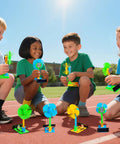 Children playing with Bulk Solar Powered STEM Kits Eight Pack Of Solar Powered Fans in outdoor setting