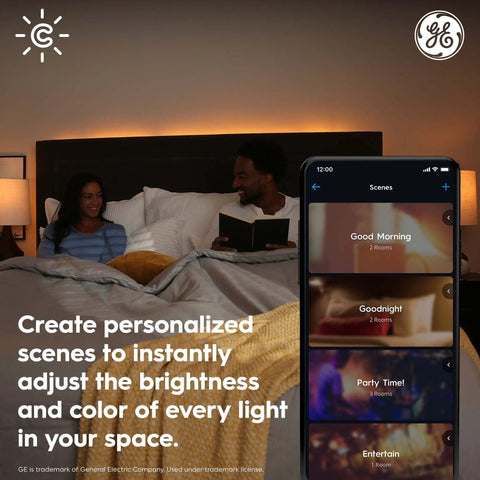 Couple in bed using app to control Cync Smart LED Wafer Downlights Kit 6 Inch Slim LED Puck Lights with color scenes