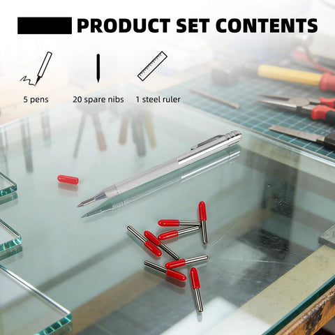 Product set of Tough As Nails Tungsten Carbide Scribe Pen with knurled aluminum handle, nibs, and ruler on glass surface.