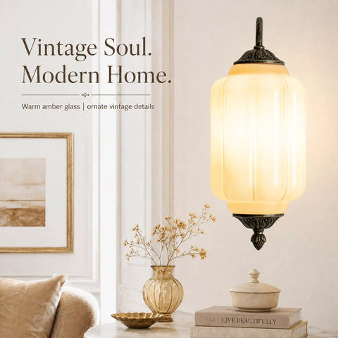 RONGHUAFUGUI Vintage Modern Wall Sconce with Amber Glass mounted on wall, showcasing ornate details and warm amber light.