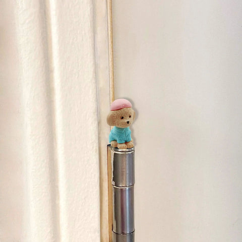 Whimsical Dog Themed Door Hinge Heads Set Of 6 Magnetic Toppers For Metal Surfaces installed on door hinge.