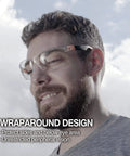 Man wearing Yellow Lens Safety Glasses With Blue Light Blocking And Night Vision Enhancement For Shooting, Gaming And Low Light Work, Anti Fog Z87.1 Eye Protection with wraparound design.