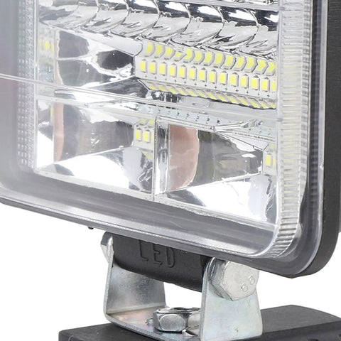 Close-up view of Mingzhe Cordless LED Flood Light 50W with USB Ports showing bright LED bulb and adjustable mount.