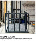 Heavy Hitting Electric Lift Table Wall Mounted Hydraulic Crane System Handles 2200 Lb Loads without Breaking A Sweat, sturdy steel frame with guardrails.