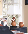 Sports Fan Youth Table Lamp 24 Inch Baseball And Football Athletic Desk Lamp in Brown and Orange on nightstand