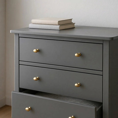 10 Pack Oval Champagne Bronze Cabinet Knobs And Furniture Pulls Single Hole Hardware Handle For Kitchen Cabinets Cupboards Dressers And Wardrobes Great For Modern Homes And Rustic Styles Easy Install Durable Finish shown on a grey dresser.