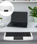 Premium Under Desk Keyboard Tray With Dead Simple Pull Out Shelf And Swivel Mouse Dock Plus Quick Grab Pen Pocket For Zero Hassle Clutter Free Home Office Setup placed under a desk with a laptop.