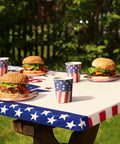 250th Anniversary Patriotic Fourth Of July Picnic Table Cover With Bench Covers 72x30 Inch shown outdoors with food and drinks