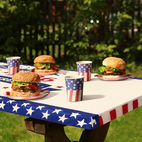 250th Anniversary Patriotic Fourth Of July Picnic Table Cover With Bench Covers 72x30 Inch shown outdoors with food and drinks