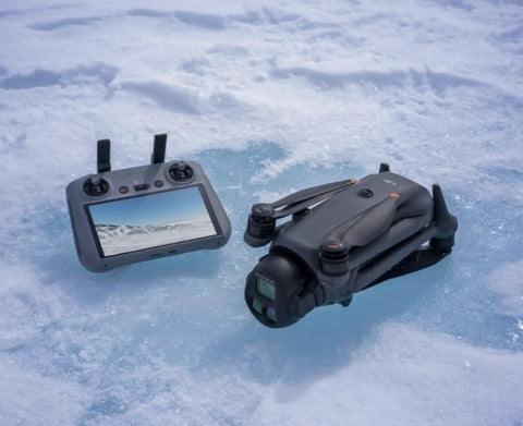 Mavic 4 Pro Drone Fly More Kit With RC 2 Controller on ice, featuring 100MP Hasselblad camera and triple camera system.