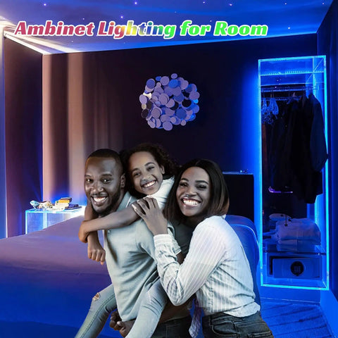120ft Bluetooth RGB LED Strip Lights With App Control illuminating a bedroom, creating a cozy colorful vibe with family in room.